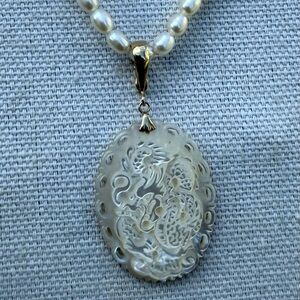 Elegant Pearl and Silver Dragon Pendant Necklace